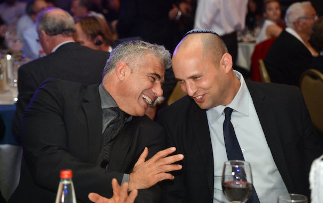 Yair Lapid and Naftali Bennett at the Manufacturers Association of Israel annual general assembly, February 26, 2014. (Photo: Yossi Zeliger/Flash 90)