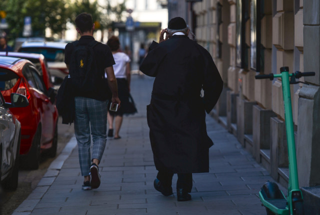 An ultra-Orthodox Jew walking in the Kazimierz area of Krakow, Poland (Photo: Artur Widak/NurPhoto via Reuters)