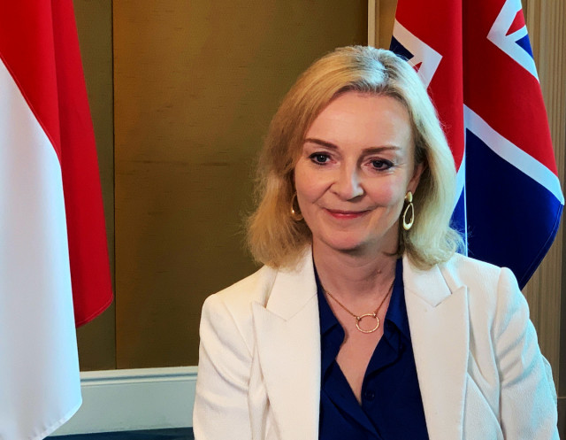 Then-British Trade Minister Liz Truss speaks to Reuters after signing a free trade agreement with Singapore, in Singapore, Dec. 10, 2020. (Photo: REUTERS/Pedja Stanisic/File Photo)