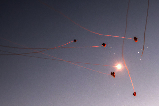Smoke trails are seen as rockets launched from the Gaza Strip are intercepted by the Israeli Iron Dome in Sderot, August 7, 2022. (Photo: Yossi Zamir/Flash90)