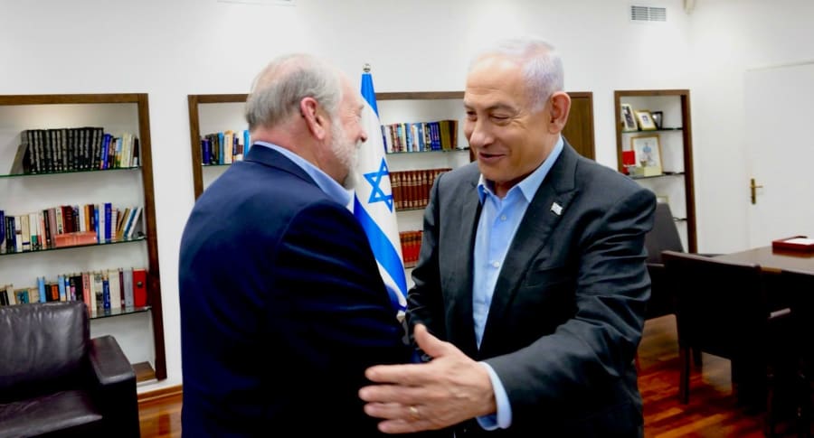 Prime Minister Netanyahu embraces his longtime friend, former Gov. Mike Huckabee. (photo credit: PMO)