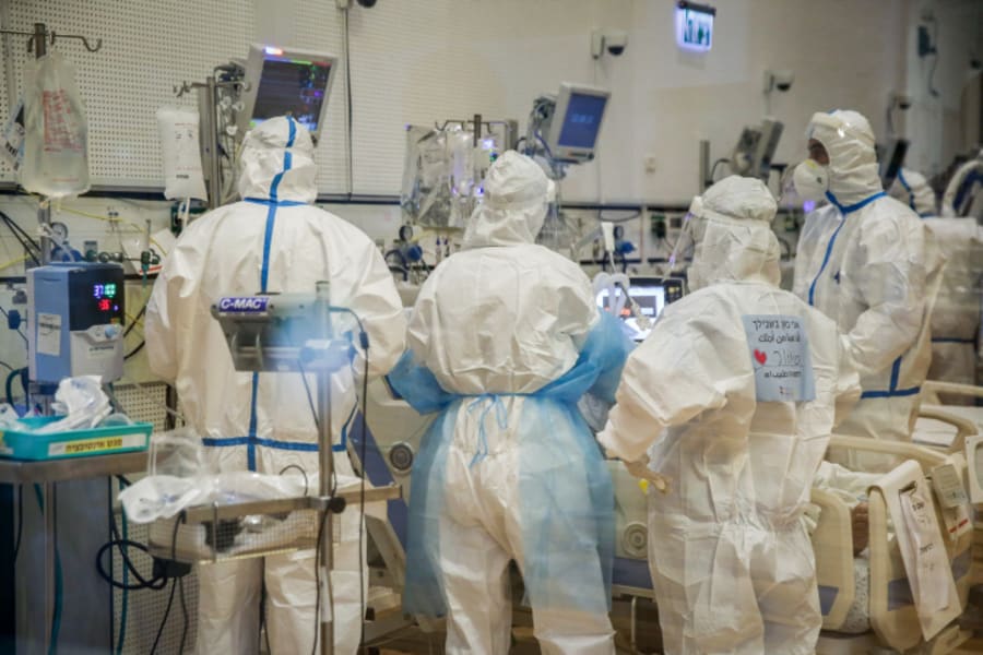 Ziv hospital team members work at the Coronavirus ward of the Ziv medical center in the northern Israeli city of Tzfat, on December 17, 2020. Photo by David Cohen/Flash90