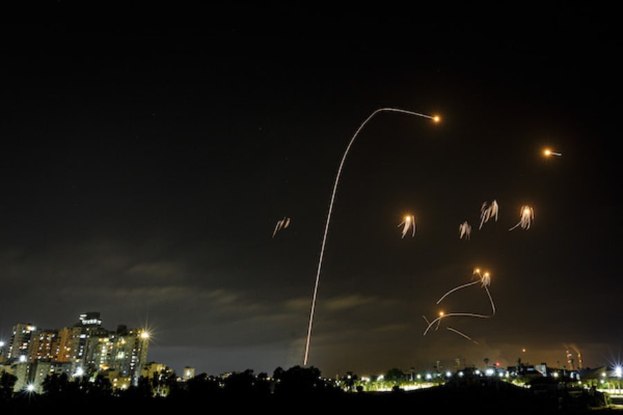 A long exposure picture shows iron dome anti-missile system fires interception missiles as rockets fired from the Gaza Strip to Israel, as it seen from the southern Israeli city of Ashkelon, May 10, 2021. Photo by Edi Israel/Flash90