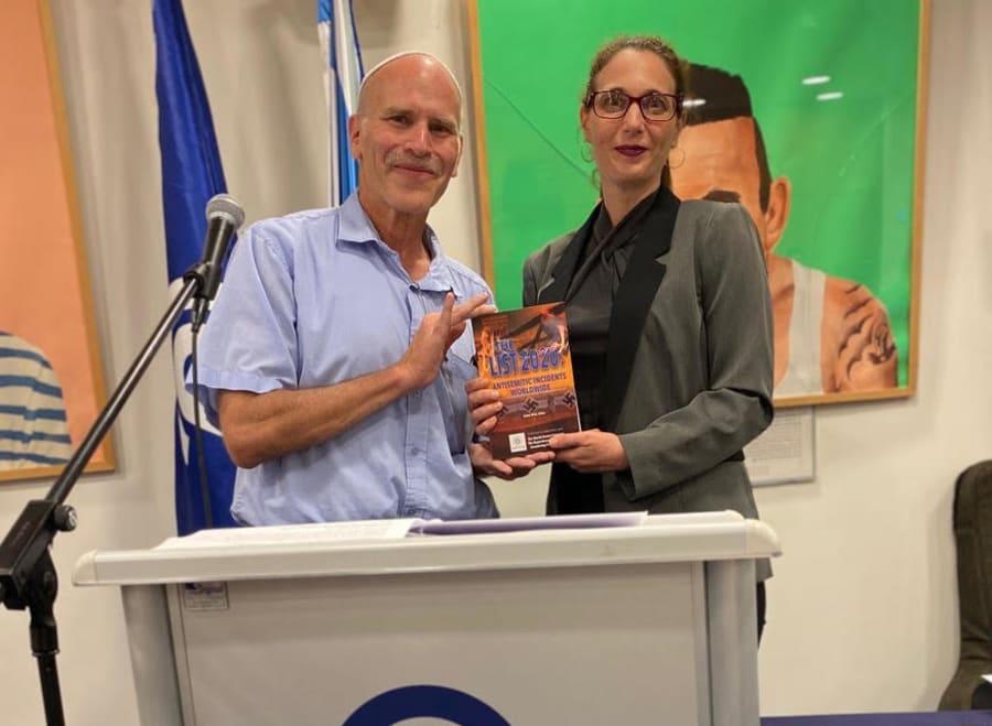 Gidon Ariel, executive director of Root Source, presents with Raheli Baratz - Rix "The List 2020: Antisemitic Incidents Worldwide"