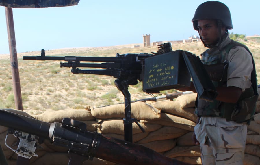 An Egyptian army soldier looks on from his position at a checkpoint in Al Arish city, the troubled northern part of the Sinai Peninsula. Picture taken July 8, 2015. REUTERS/Stringer