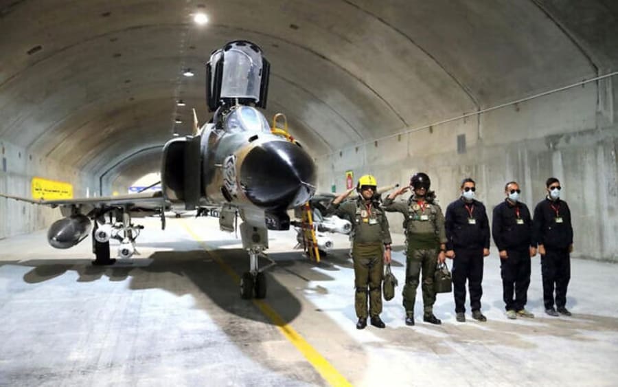 Pilots pose with a F-4 Phantom at a new underground Iranian Air Force base in this picture released Feb. 7, 2023 (Photo: Iranian Army)