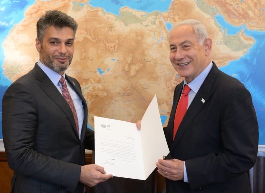 Israeli Prime Minister Benjamin Netanyahu receives invitation to the COP28 Climate Change Conference 2023 in Dubai by UAE Ambassador to Israel Mohammed Al Khaja, May 22, 2023 (Photo: Amos Ben-Gershom/GPO)
