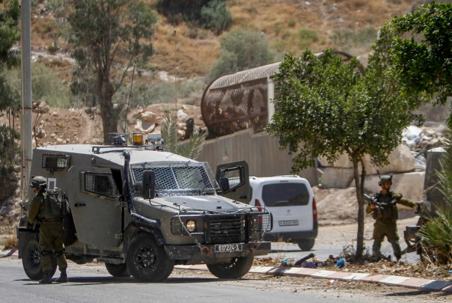 Israeli soldiers block the area near the scene of a shooting attack in the Jordan Valley, August 2, 2023. (Photo: Nasser Ishtayeh/Flash90)