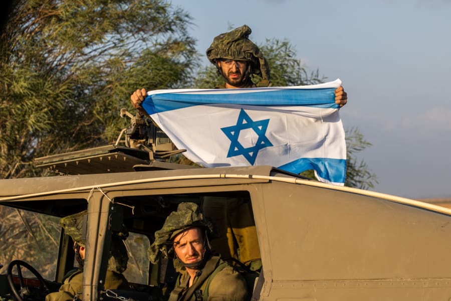 Israeli soldiers patrol on a road near the Israeli-Gaza border, in southern Israel, October 11, 2023. (Photo: Chaim Goldberg/Flash90)