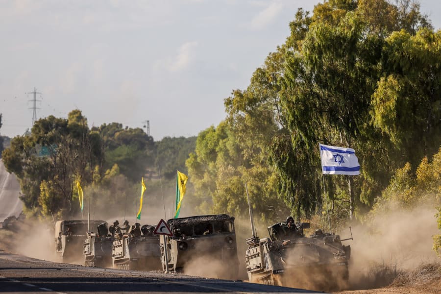 A convoy of Israeli military vehicles seen near the Israeli-Gaza border, October 15, 2023. (Photo: Chaim Goldberg/Flash90)