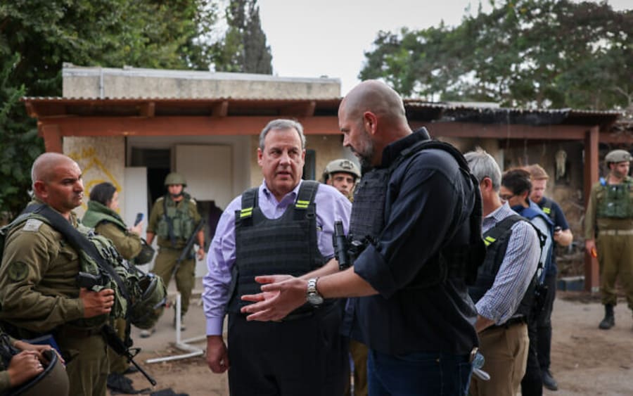 Republican US presidential candidate Chris Christie speaks with Knesset Speaker Amir Ohana during a visit to the devastated Kibbutz Kfar Aza, November 12, 2023. (Photo: Noam Moskowitz/Knesset Spokesperson)