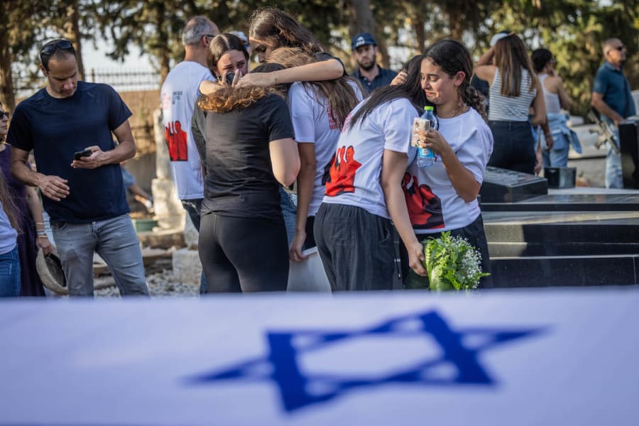 Family and friends attend the funeral of three members of the Sharabi family, Lian, Noya and Yahel, who were murdered by Hamas terrorists in Kibbutz Be'eri on October 7, 2023, in Moshav Kfar HaRif, Oct. 25, 2023. (Photo: Chaim Goldberg/Flash90)