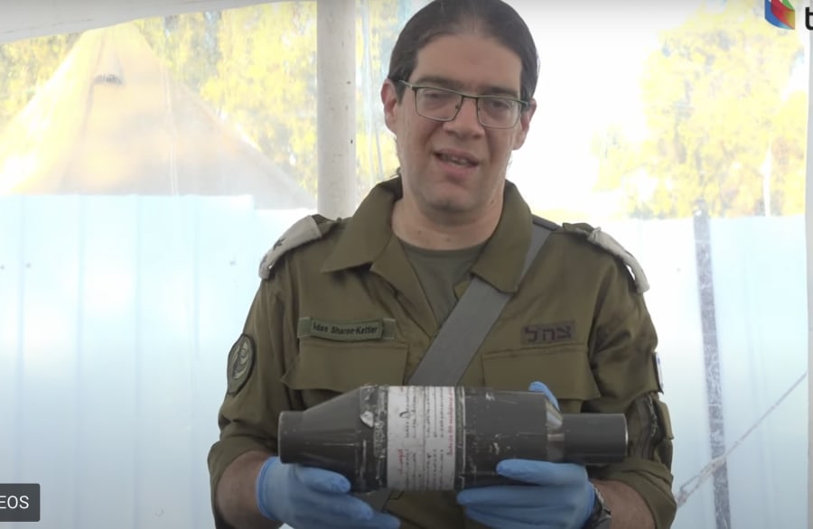 Lt.-Col. Idan Sharon-Kettler shows Hamas weapons to international journalists (Photo: Screenshot)
