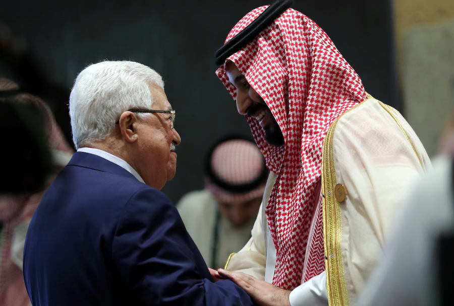 Saudi Arabia's Crown Prince Mohammed bin Salman greets Palestinian Authority President Mahmoud Abbas before the start of the 29th Arab Summit in Dhahran, Saudi Arabia April 15, 2018. (Photo: REUTERS/Hamad I Mohammed)