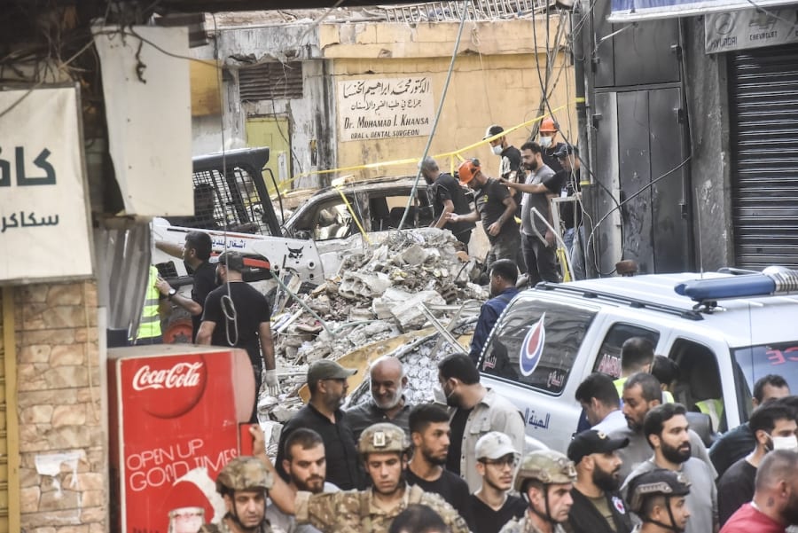 Security forces and medical teams arrive in the area after the Israeli Air Forces strike Hezbollah targets in Dahiyeh, a southern suburb of Beirut, Lebanon, September 24, 2024. (Photo by Fadel Itani/NurPhoto)