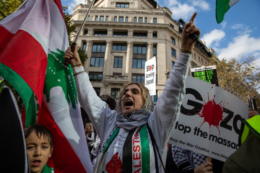 A pro Palestinian demonstrator shouts during the rally. Palestinian and Israeli supporters take to the streets of London on the latest National March For Palestine. Oct. 5, 2024. (Photo: James Willoughby / SOPA Images via Reuters)