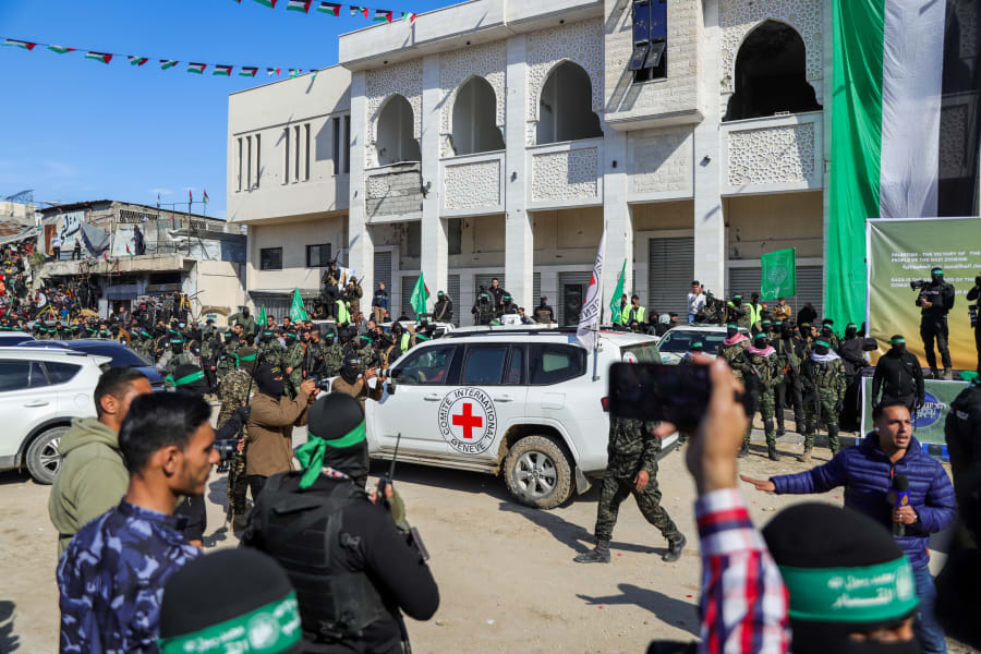 Illustrative: Hamas terrorists hand over four Israeli hostages to the Red Cross in Palestine Square, Gaza City, on Jan. 25, 2025. Photo by Khalil Kahlout/Flash90