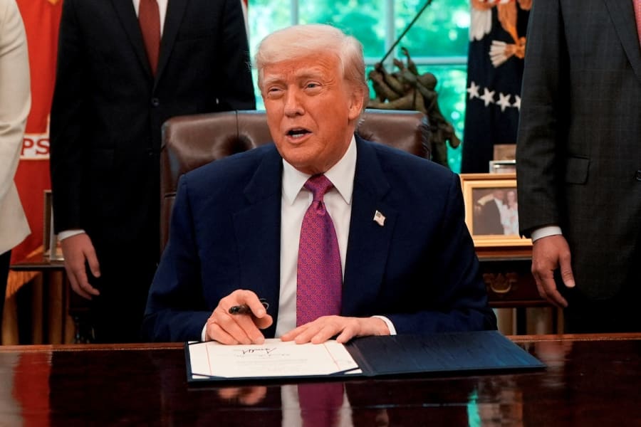 U.S. President Donald Trump signs a joint resolution in the Oval Office at the White House in Washington, D.C., May 9, 2025. (Photo: REUTERS/Kent Nishimura)