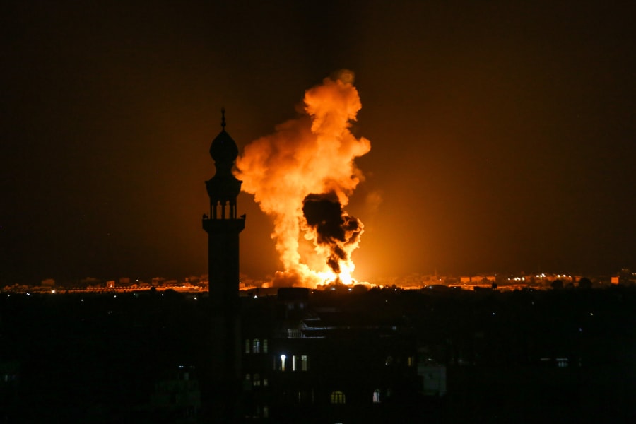 A ball of fire and smoke rises during Israeli airstrikes in Khan Younis, in the Gaza Strip, on August 7, 2022. Photo by Abed Rahim Khatib/Flash90