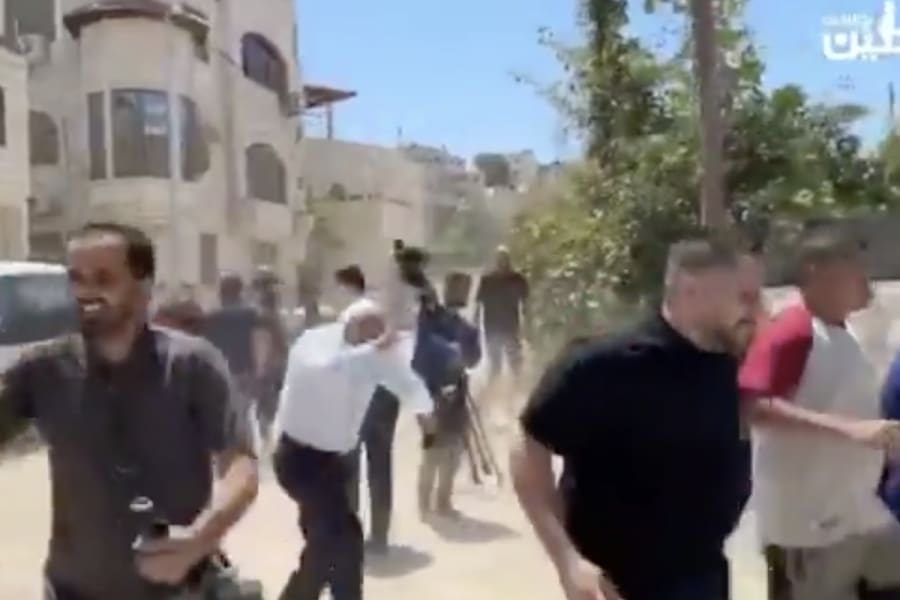 Foreign diplomats taking cover as IDF soldiers shoot warning shots in Jenin, May 21, 2025. (Photo: Screenshot)