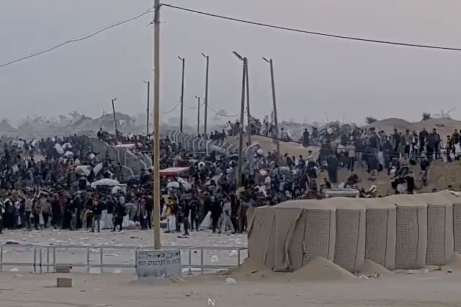 Security footage released by GHF, showing Gazans receiving aid, June 1, 2025. (Photo: Screenshot)