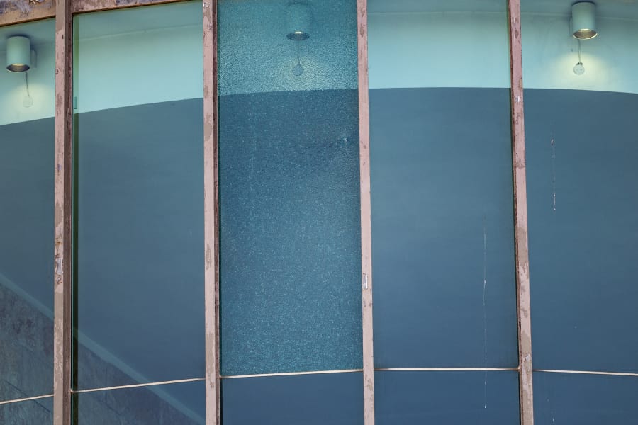Police and guards at the scene where a window was found broken at the Supreme Court in Jerusalem on June 6, 2025. (Photo: Oren Ben Hakoon/Flash90)