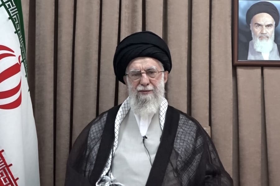 June 18, 2025, Tehran, Iran: Iranian Supreme Leader Ayatollah ALI KHAMENEI in a televised speech, under a portrait of the late revolutionary founder Ayatollah Khomeini. Israel and Iran have been exchanging fire since Israel launched strikes across Iran on 13 June 2025 as part of Operation 'Rising Lion.