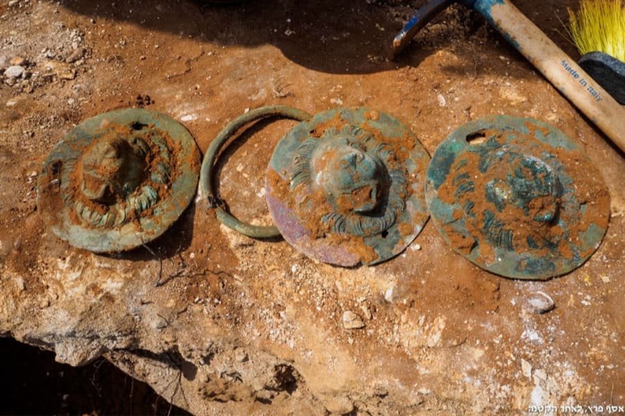 Three of the lion heads as they were discovered on the site, June 26, 2025. (Photo: Assaf Peretz/Israel Antiquities)