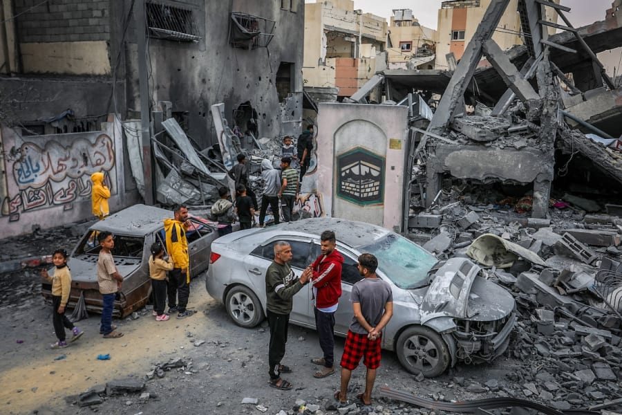 Palestinians at the site of an Israeli airstrike in Khan Younis, in the southern Gaza Strip, April 1, 2025. (Photo: Abed Rahim Khatib/Flash90)