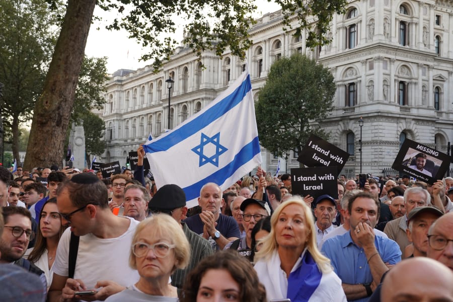 People attending a vigil outside Downing Street, central London, for victims and hostages of Hamas attacks. Monday October 9, 2023. Photo: Reuters