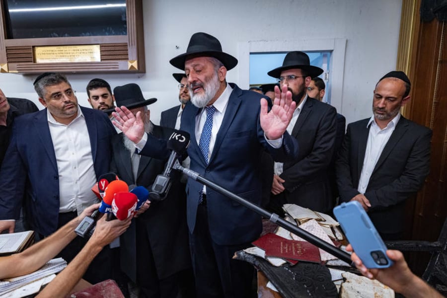 Head of Shas party Aryeh Deri and Shas spiritual leader Rabbi Yitzhak Yosef visit at the scene of suspected arson and vandalism at a Jerusalem synagogue which is often frequented by Rabbi Yosef, June 8, 2025. Photo by Yonatan Sindel/Flash90