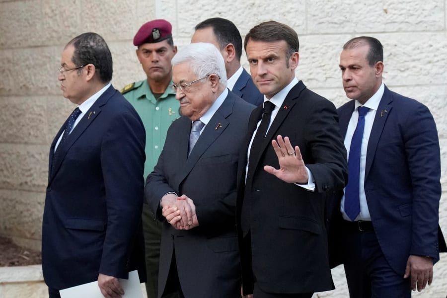 French President Emmanuel Macron shakes hands with the Palestinian Authority President Mahmoud Abbas, in Ramallah, October 24, 2023. (Photo: Christophe Ena/Pool via REUTERS)