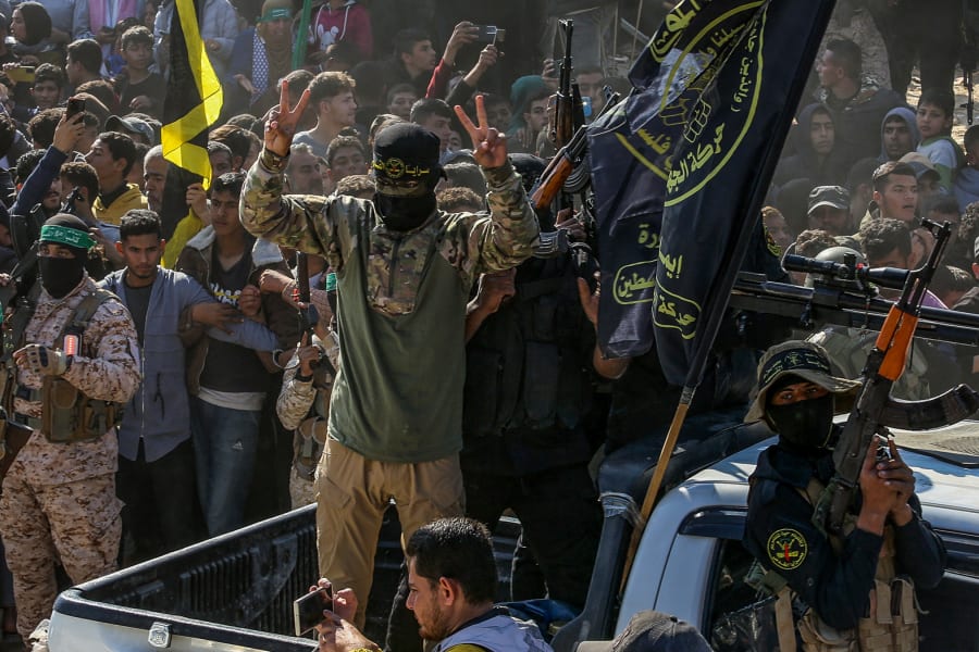 Illustrative: Hamas and Islamic Jihad terrorists celebrate in Khan Younis, southern Gaza, January 30, 2025. (Photo: Abed Rahim Khatib/Flash90)