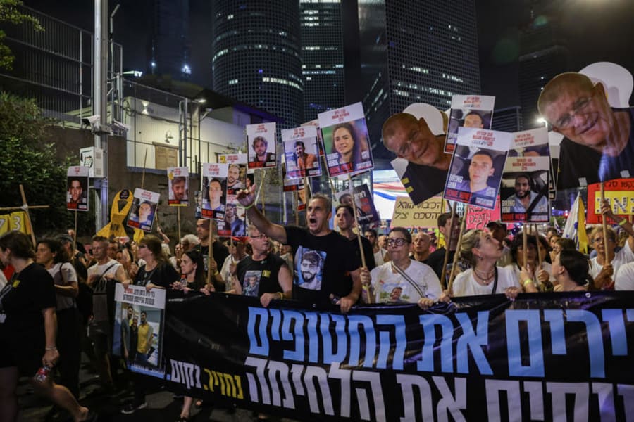 Demonstrators protest against the Israeli government and for the release of Israelis held hostage in the Gaza Strip outside Hakirya Base in Tel Aviv, Aug. 9, 2025. Photo by Miriam Alster/Flash90