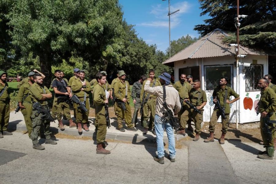 Illustrative: IDF reserve units help guard a Kibbutz near the Syrian border in northern Golan Heights on Oct. 8, 2023. Photo by Michael Giladi/Flash90