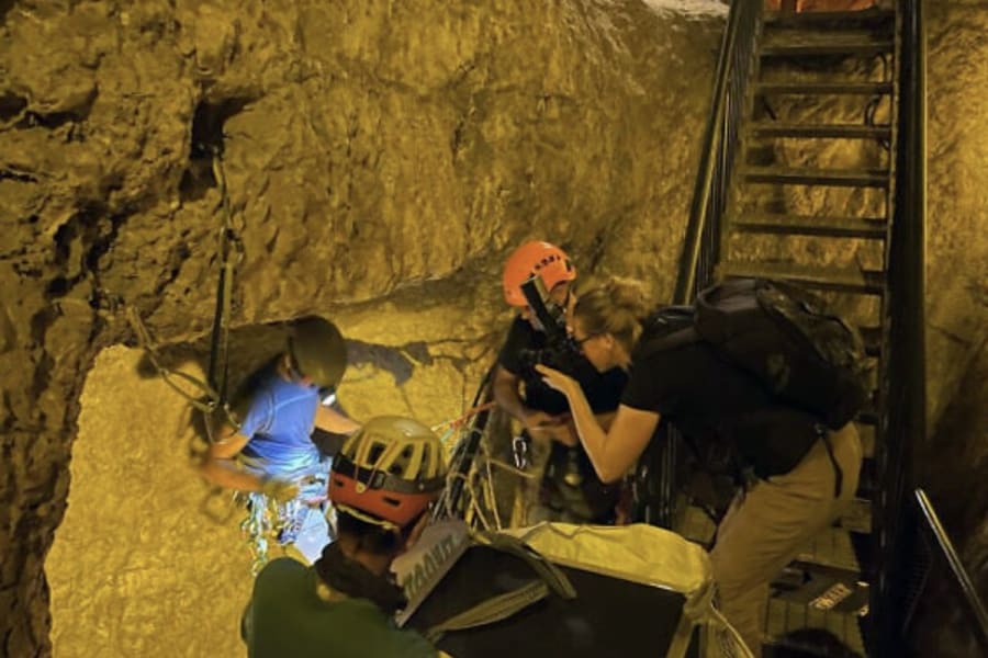 Researchers place a muon detector in a cavern beneath the Gihon Spring in 2023. (Photo: Gilad Mizrachi / Tel Aviv University)