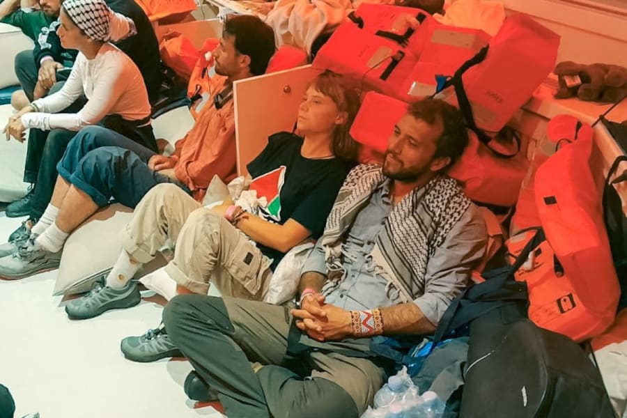 Greta Thunberg and other pro-Palestinian activists from the Sumud Flotilla being taken to Israel after the boat was intercepted by the Israeli navy (Photo: Israel Ministry of Foreign Affairs)