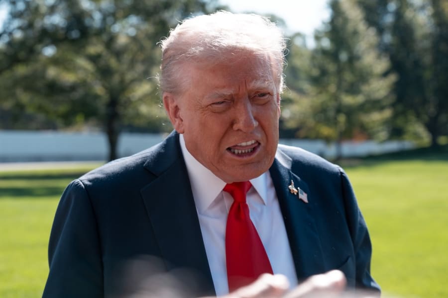 US President Donald Trump takes questions from the White House press as he boards his helicopter for a flight to Norfolk, VA, Oct. 5, 2025. (Photo: Andrew Leyden/NurPhoto)
