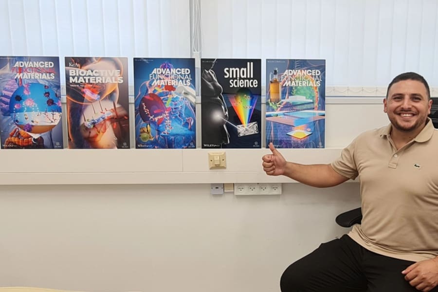 Dr. Shady Farah, assistant professor at the Technion – Israel Institute of Technology’s Faculty of Chemical Engineering, receives a metal print gift highlighting his lab’s pioneering research on smart, multi-purpose medical materials and breakthrough therapeutic technologies. The featured images were selected as covers of leading scientific journals in recognition of his team’s significance and impact. (Photo: LinkedIn)