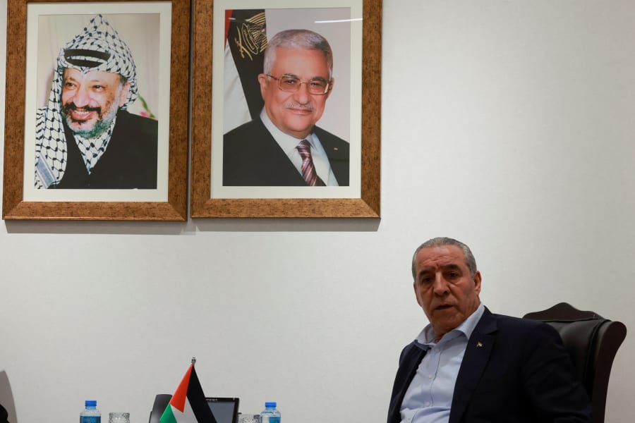 Hussein Al-Sheikh, Secretary General of the Executive committee of the Palestine Liberation Organization (PLO), speaks during an interview with Reuters, in Ramallah, December 16, 2023. REUTERS/Ammar Awad