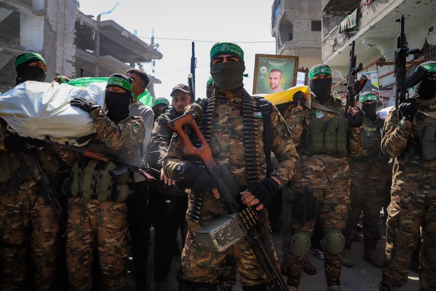 Illustrative - Members of the Al-Qassam Brigades, the military wing of Hamas and mourners attend the funeral of Al-Qassam fighters who were killed during the war between Israel and Hamas in the Al-Shati camp, in Gaza City, February 28, 2025. (Photo: Khalil Kahlout/Flash90)