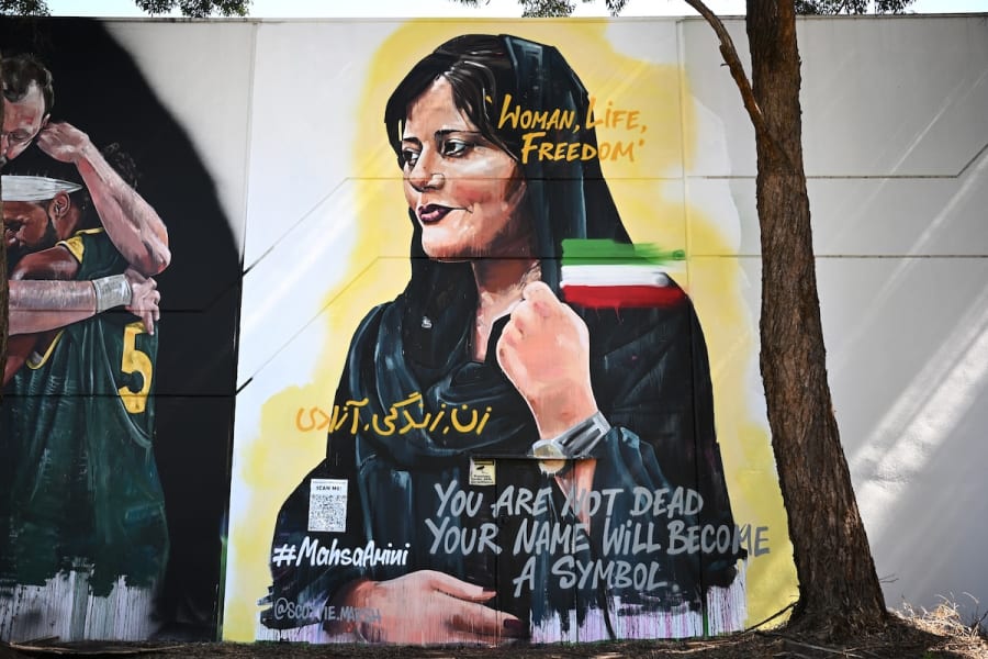 A mural of Mahsa Amini by artist Scott Marsh is seen in Alexandria, Sydney, Friday, Oct. 28, 2022. (Photo: AAP Image/Dan Himbrechts)