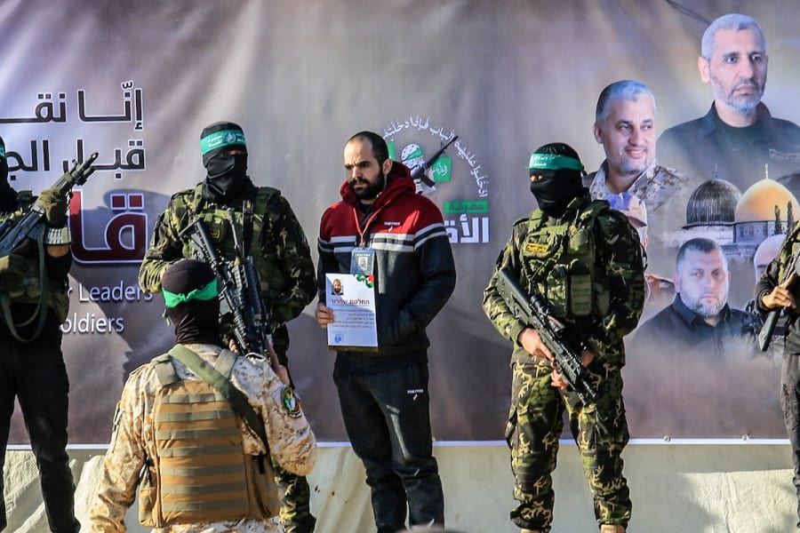 Al-Qassam Brigades hand over Israeli hostages Ofer Kalderon and Yarden Bibas to the Red Cross, as part of the ceasefire agreement between Israel and Hamas, in Khan Younis, southern Gaza Strip. February 1, 2025. (Photo: Abed Rahim Khaatib/Flash90)