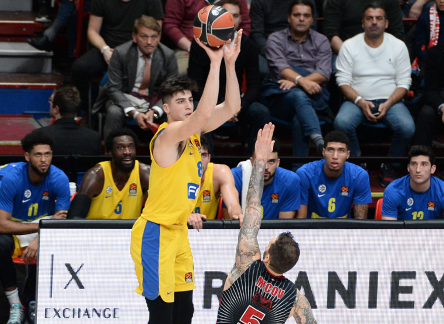 Deni Avdija (left) attempts a three-pointer in a EuroLeague game, Nov. 2019 (Photo Ciamillo-Castoria/ Claudio Degaspari via Wikimedia Commons)