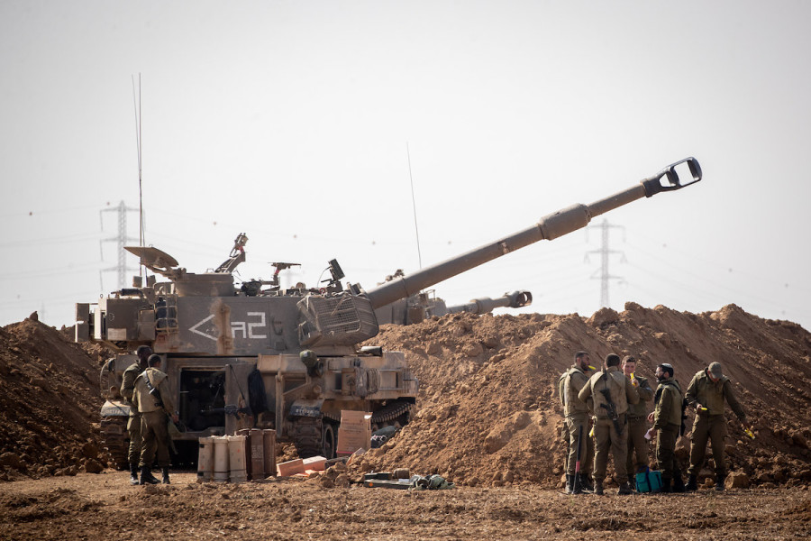 Israeli soldiers and IDF Artillery at a staging area in Southern Israel, near the border with neighbouring Palestinian Gaza Strip on November 13, 2019. (Photo by Yonatan Sindel/Flash90)