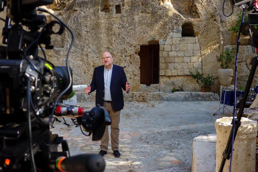ICEJ President Jurgen Buhler films a session at the Garden Tomb for the upcoming Feast of Tabernacles which had to move online this year due to COVID closures in Israel. (Photo: ICEJ)