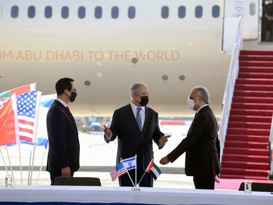 PM Benjamin Netanyahu (center) with U.S. Secretary of the Treasury Steven Mnuchin (left) and UAE Minister of State for Financial Affairs Obaid Humaid Al Tayer at welcoming ceremony for first official UAE state visit to Israel. (Photo: GPO/Amos Ben Gershom)
