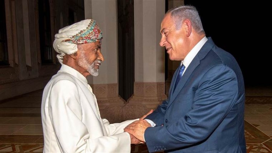 Prime Minister Benjamin Netanyahu shakes hands with Sultan Qaboos bin Said of Oman in 2018. (Photo credit: GPO)