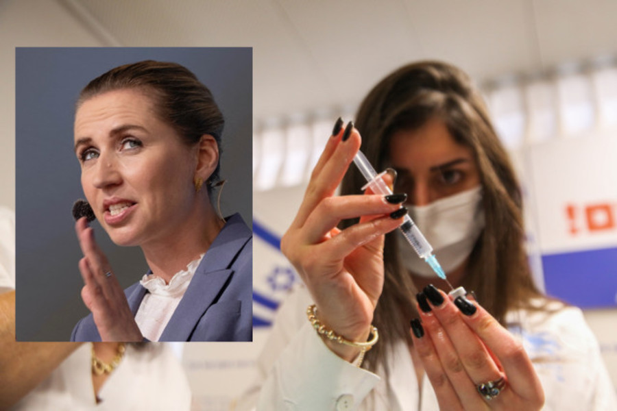 File photo of an Israeli medical worker holding a vaccine vial