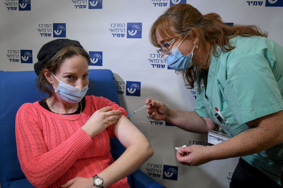 Israeli teacher receives a COVID-19 vaccine at the Shamir Medical Center in Be'er Ya'akov on Dec. 30, 2020. (Photo: Avi Dishi/Flash90)